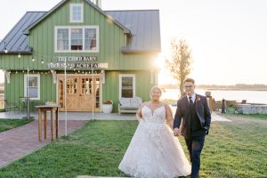 Picture of wedding venue with couple walking hand in hand.